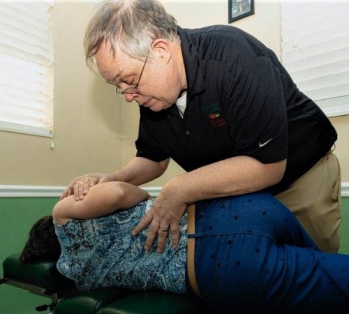 Dr. Van Tassel performing an adjustment