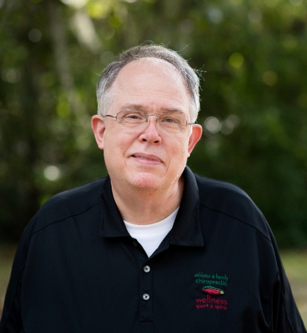 A head shot of Dr. John Van Tassel