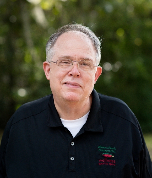 A head shot of Dr. John Van Tassel